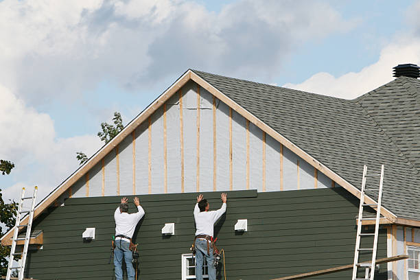 Professional Siding technician working in Newport, SC